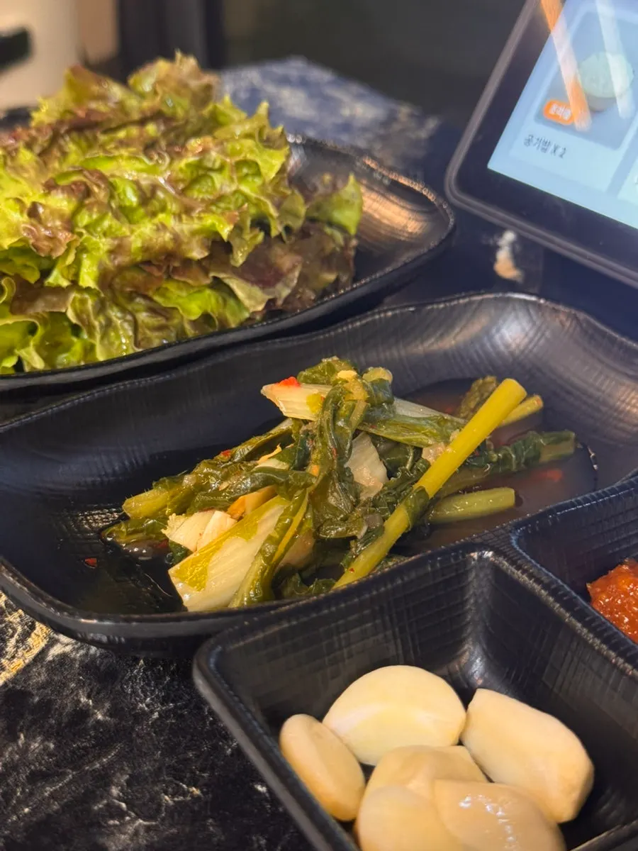 Hwagye Dakgalbi's side dish spread