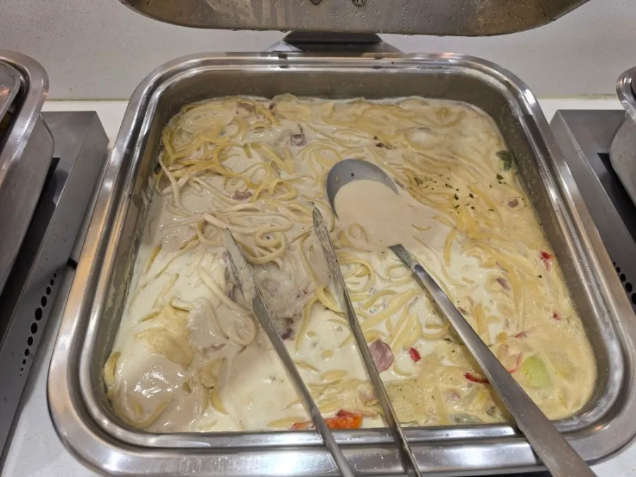Dishes on the buffet's warming station
