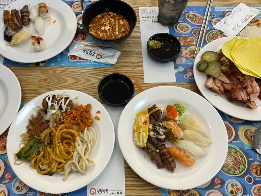 Various sushi and salad dishes