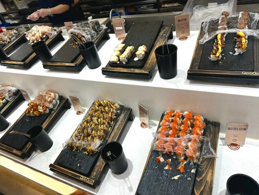 Sushi station with rolls and gunkan