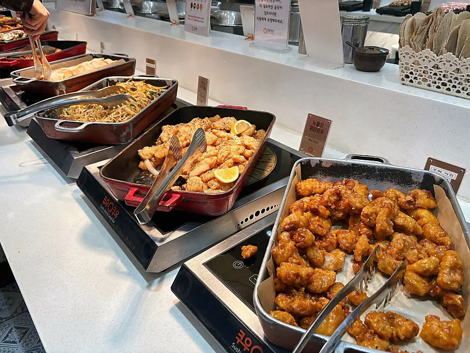 Plate loaded with various rolls from the buffet