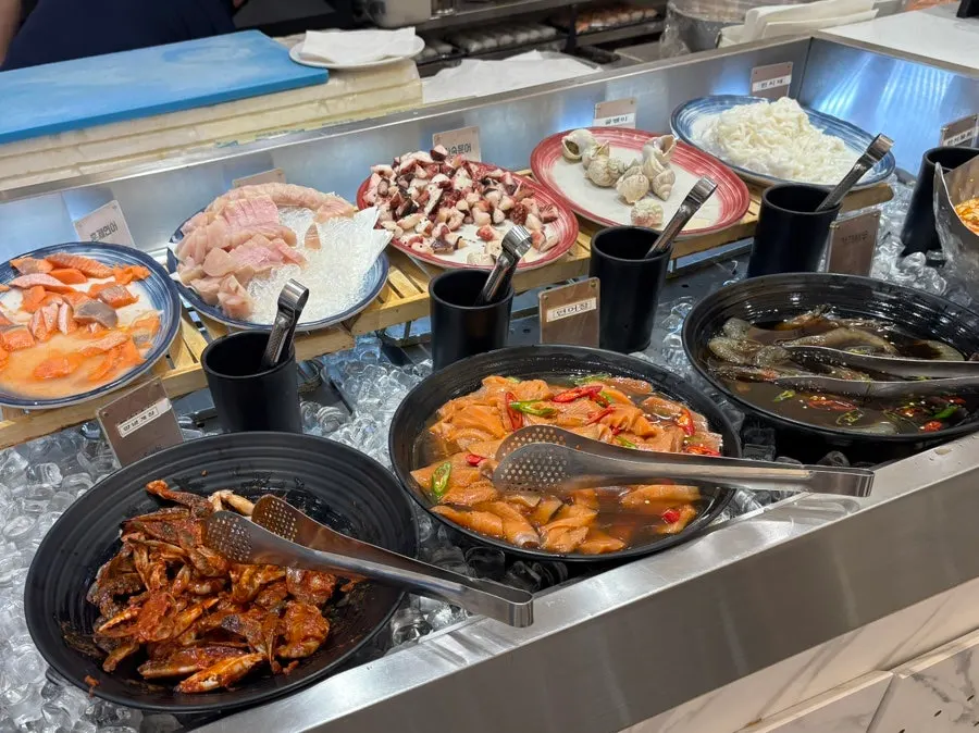 Sushi station being refilled quickly