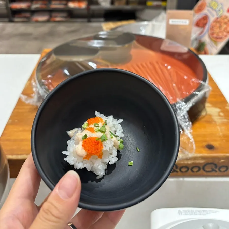 Seafood options including sashimi, marinated crab, and soy-marinated salmon