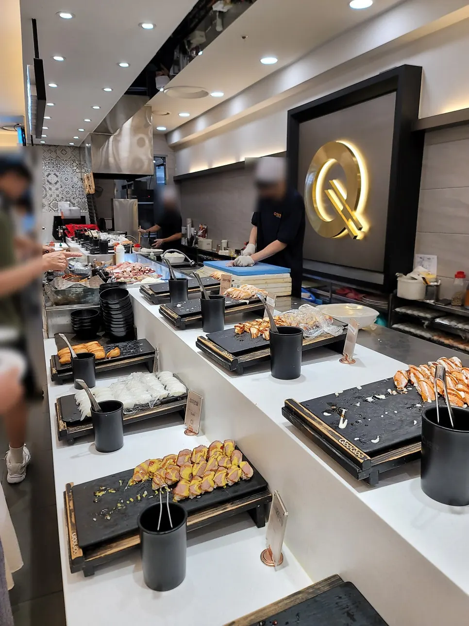 Salmon sushi and beef sushi at the live station