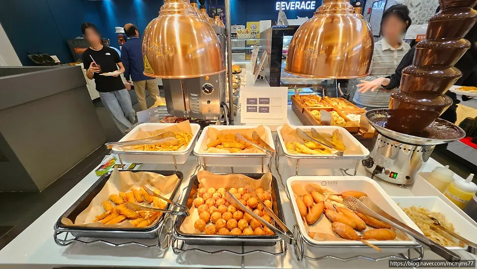 Table filled with various buffet dishes