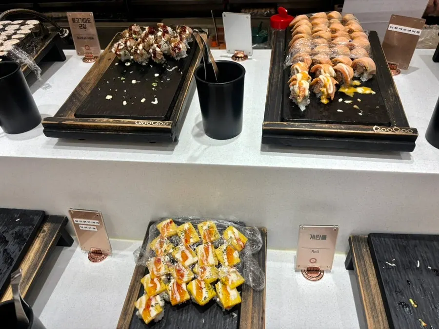 Gimbap rolls and furikake rolls on the buffet line