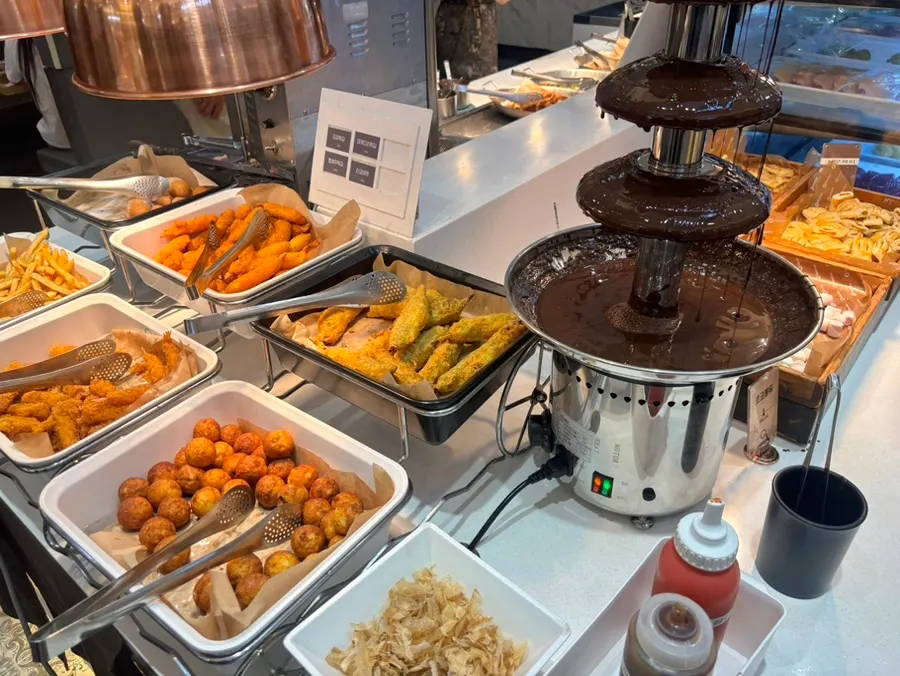 Fried food counter with chicken and fried shrimp