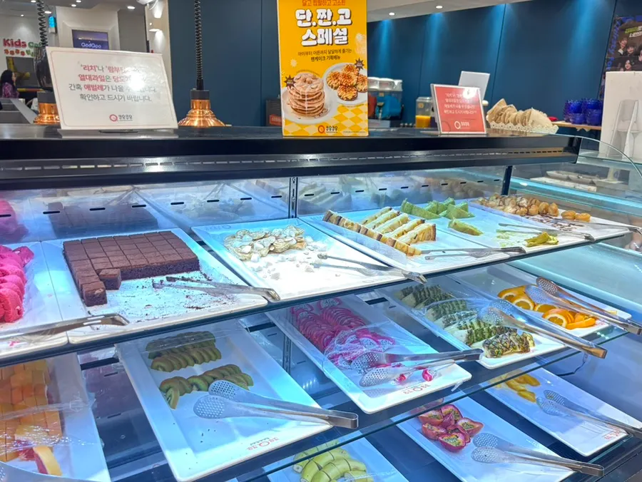 Brownies and matcha cake on the dessert display