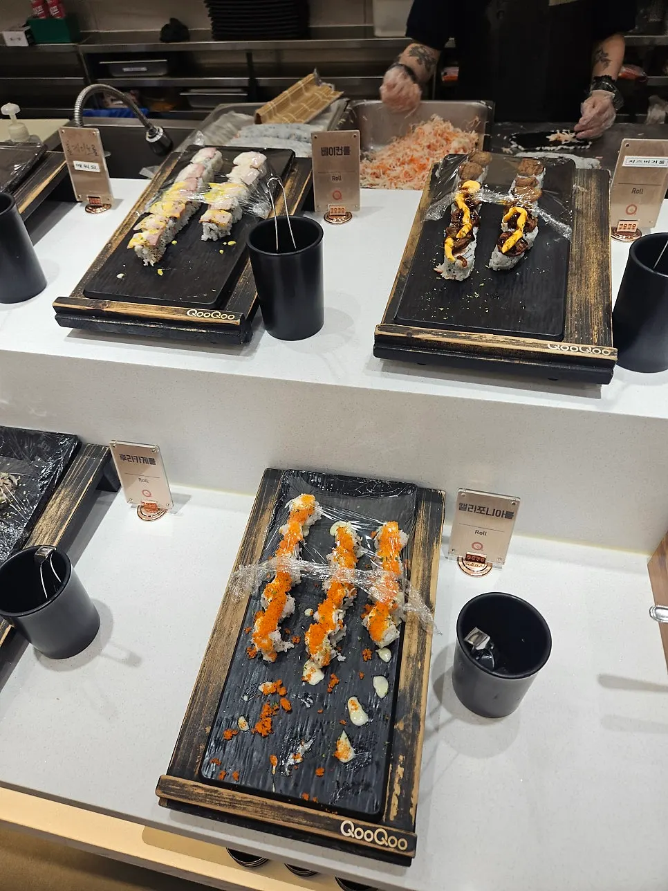Inside QooQoo Chuncheon Branch with generous table spacing