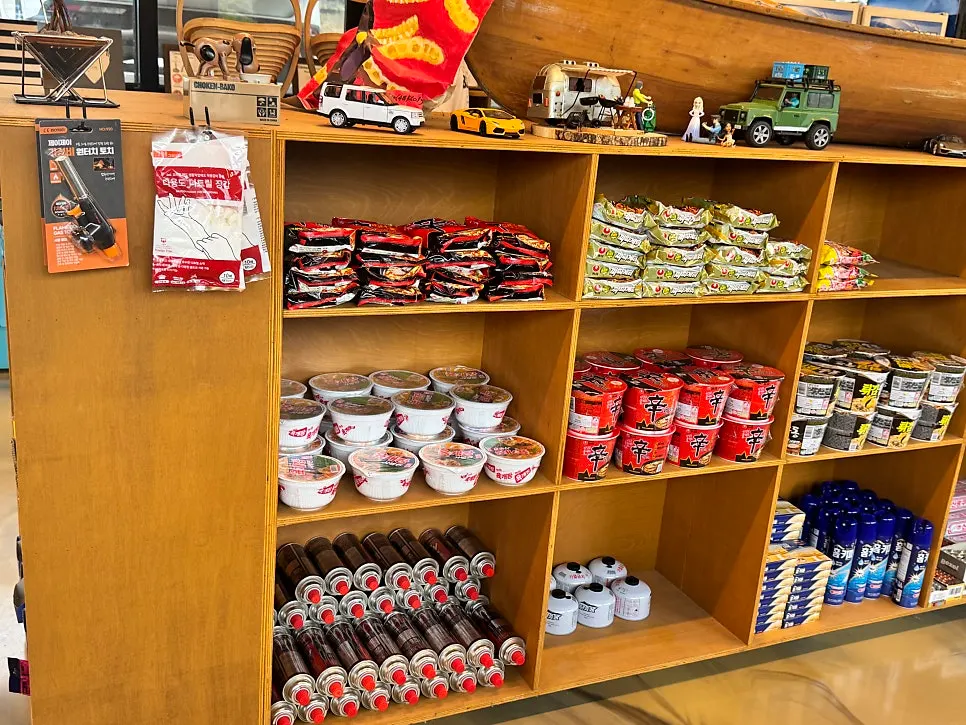 Camping supplies and drinks displayed in the store