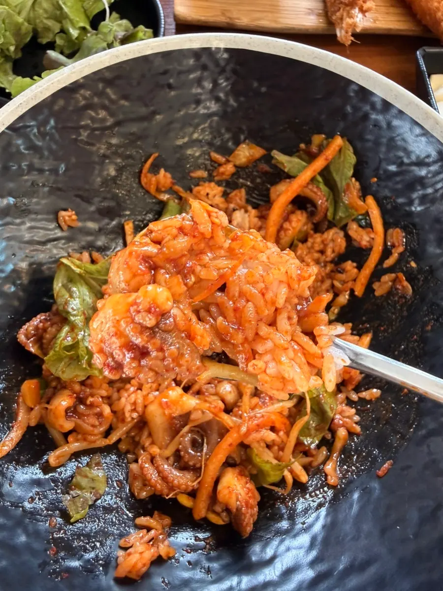 Jjukkumi rice mixed with radish salad and bean sprouts