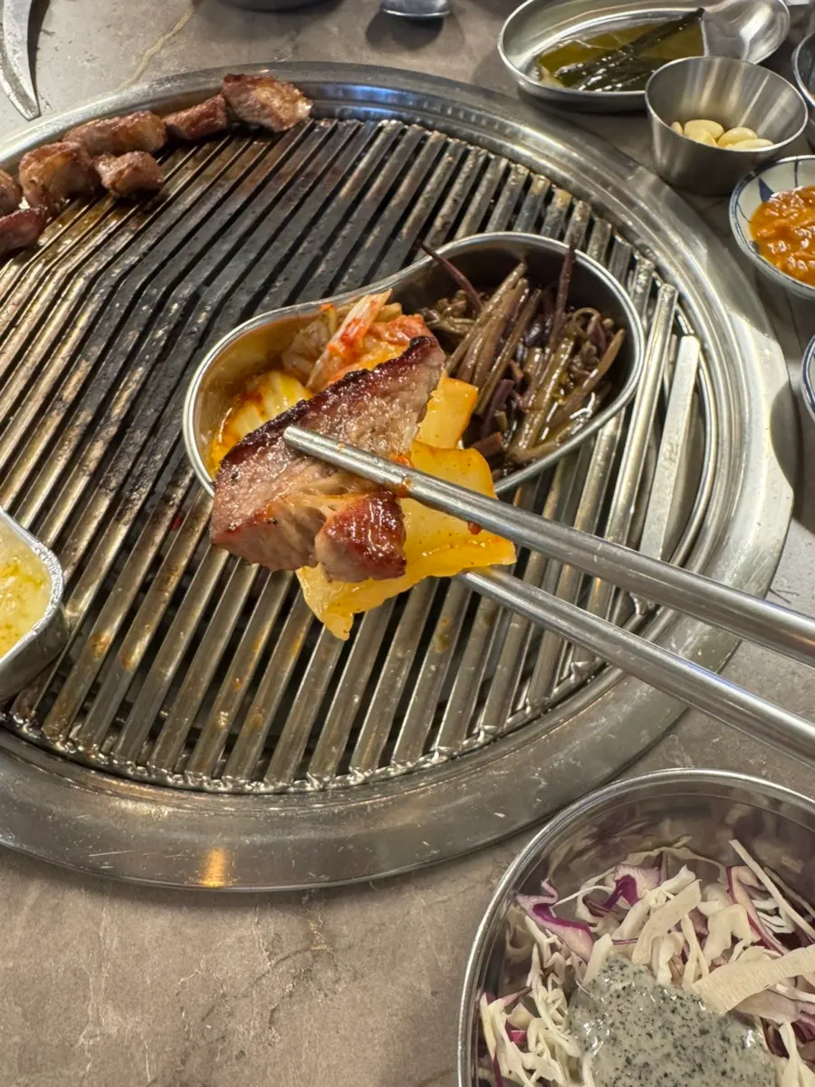 Grilled pork served with cheese