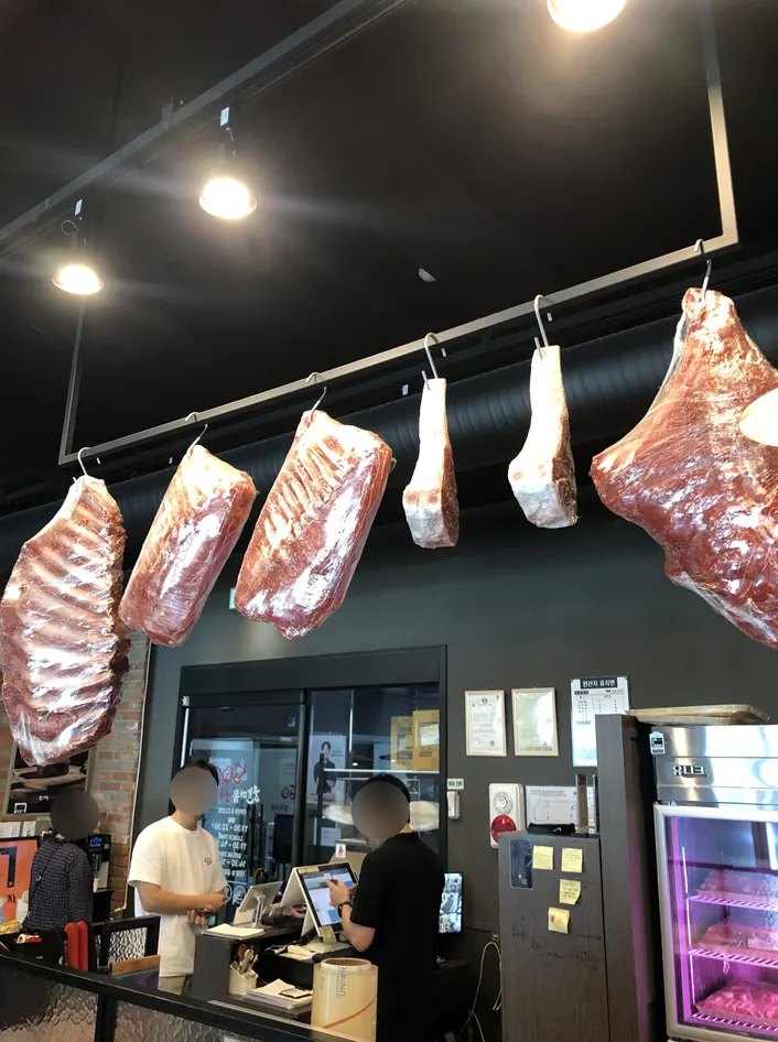 Pork hanging in the low-temperature aging fridge