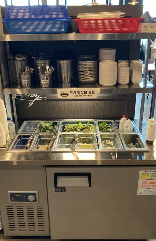 A piece of meat placed on a lettuce wrap