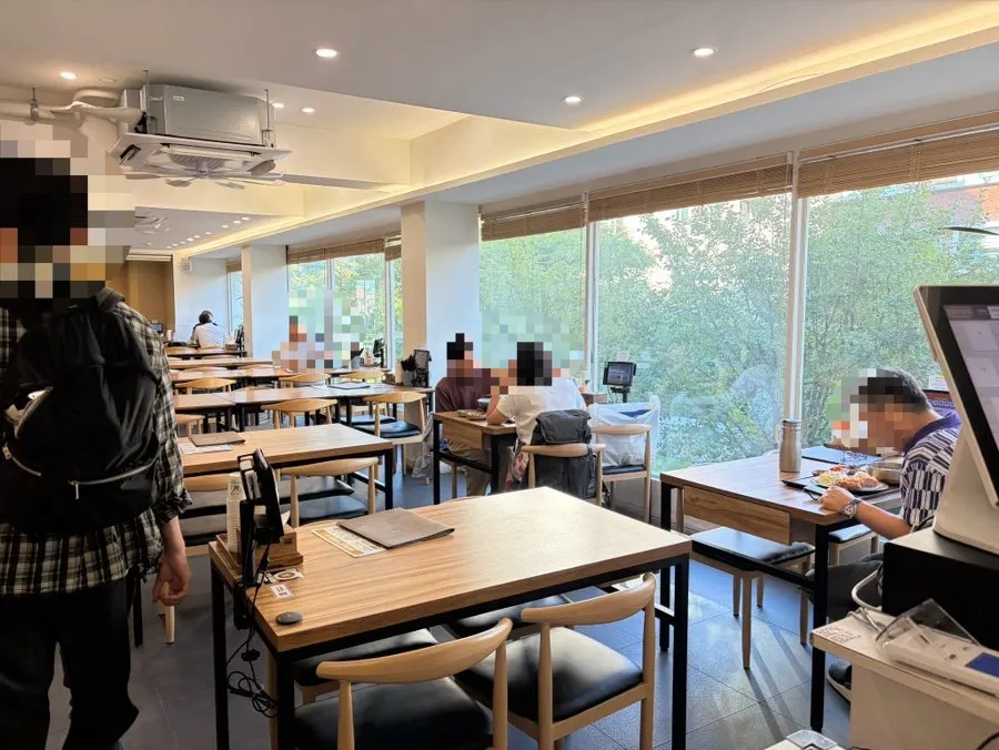 Interior of Nagwon-ui Soba's 2nd floor with floor-to-ceiling windows