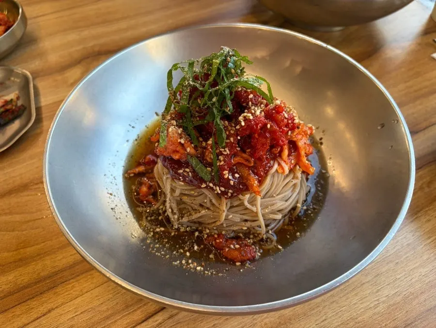 Lemon soba topped with lemon slices at Nagwon-ui Soba