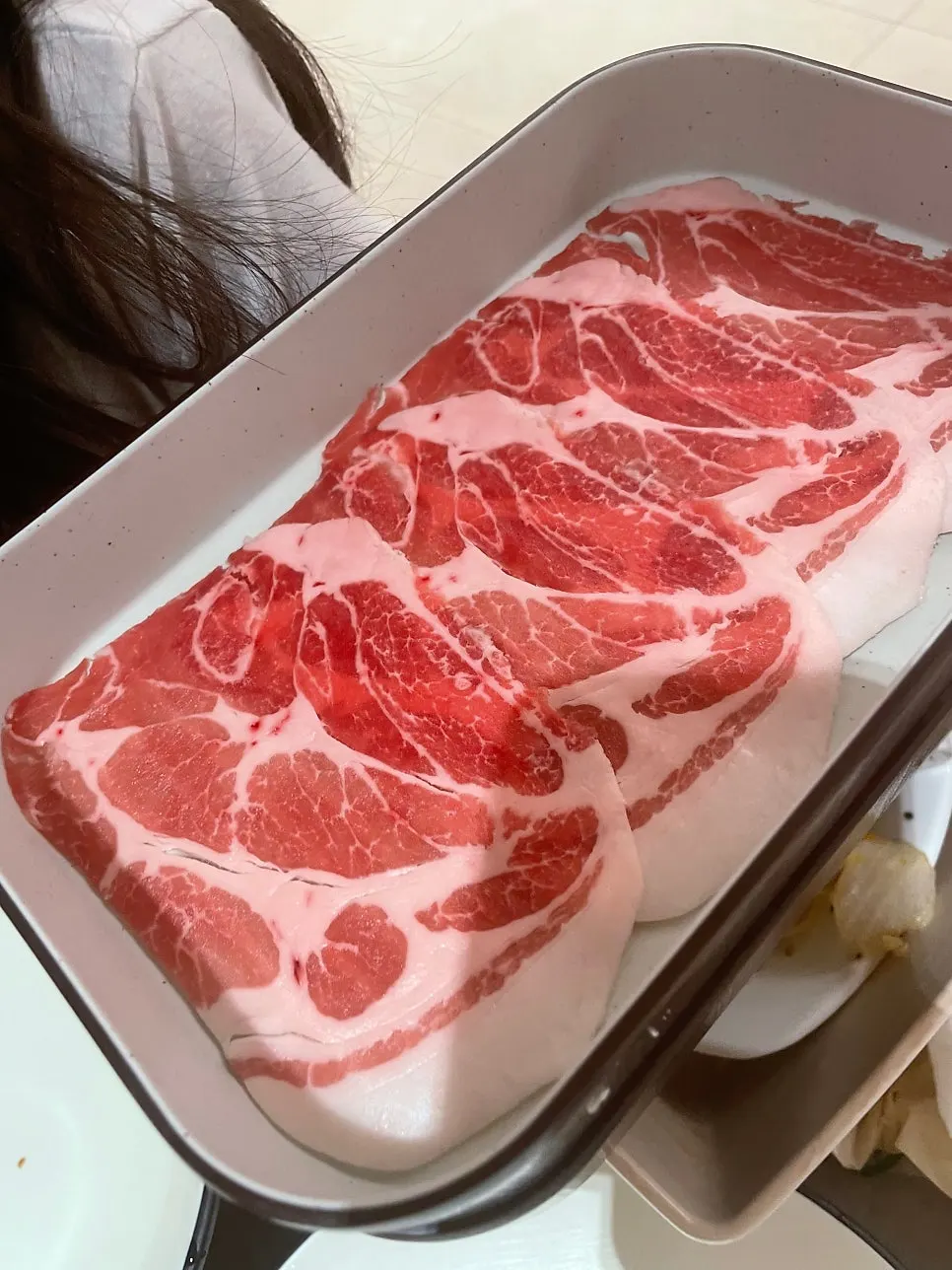 Plate of all-you-can-eat beef and pork