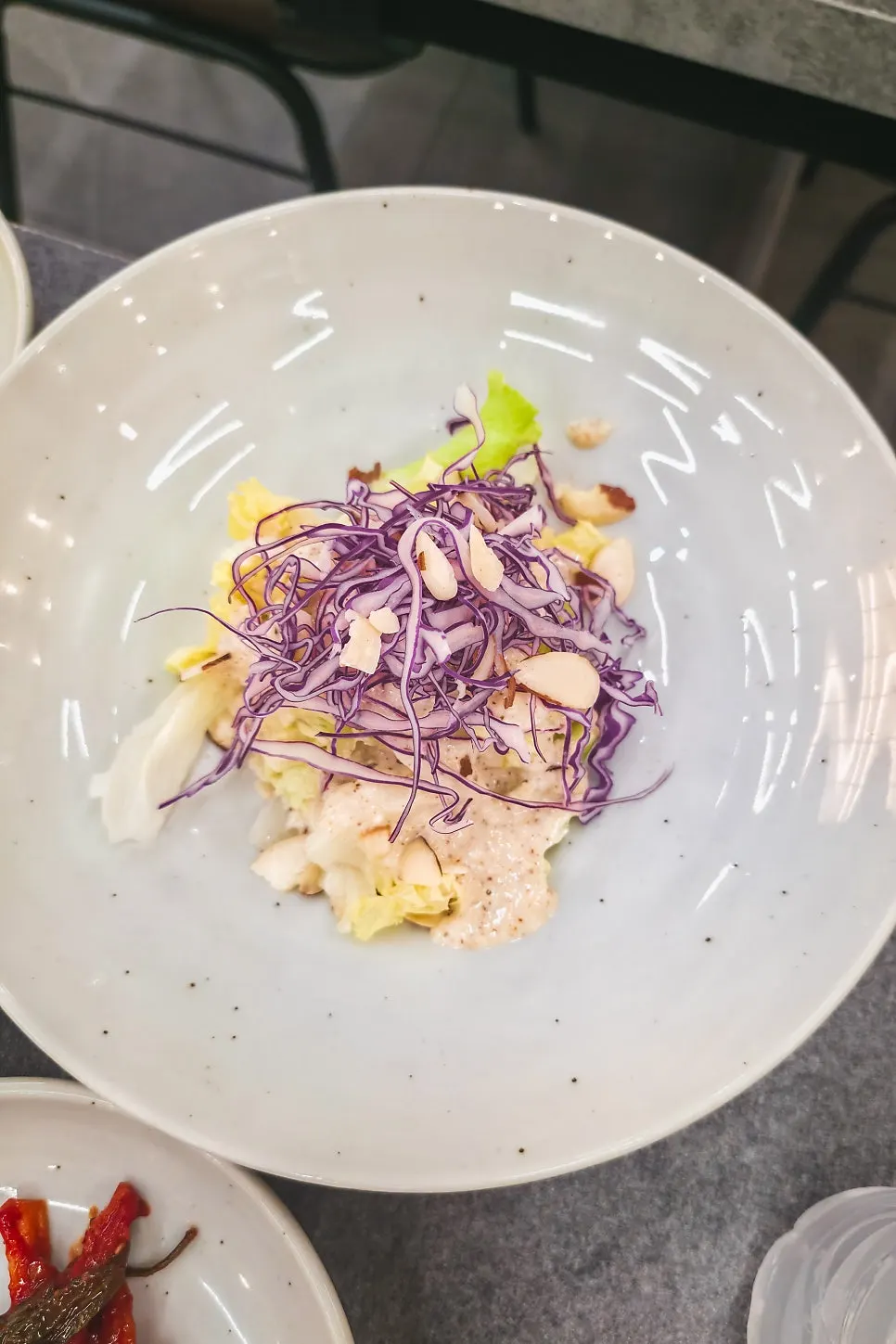 A piece of kodari placed over white rice