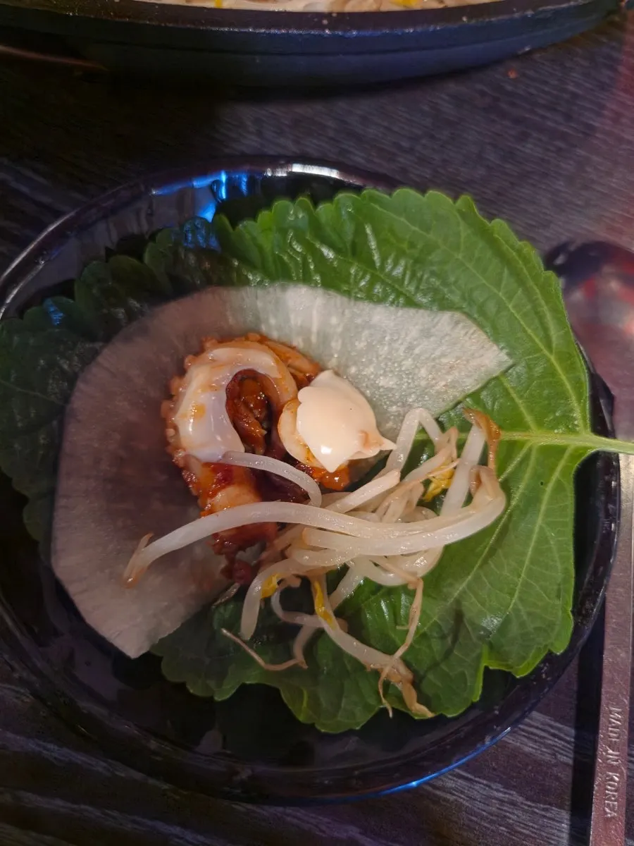 Octopus dipped in the special mayo sauce