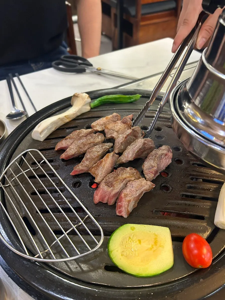One serving of galbi with a bowl of rice