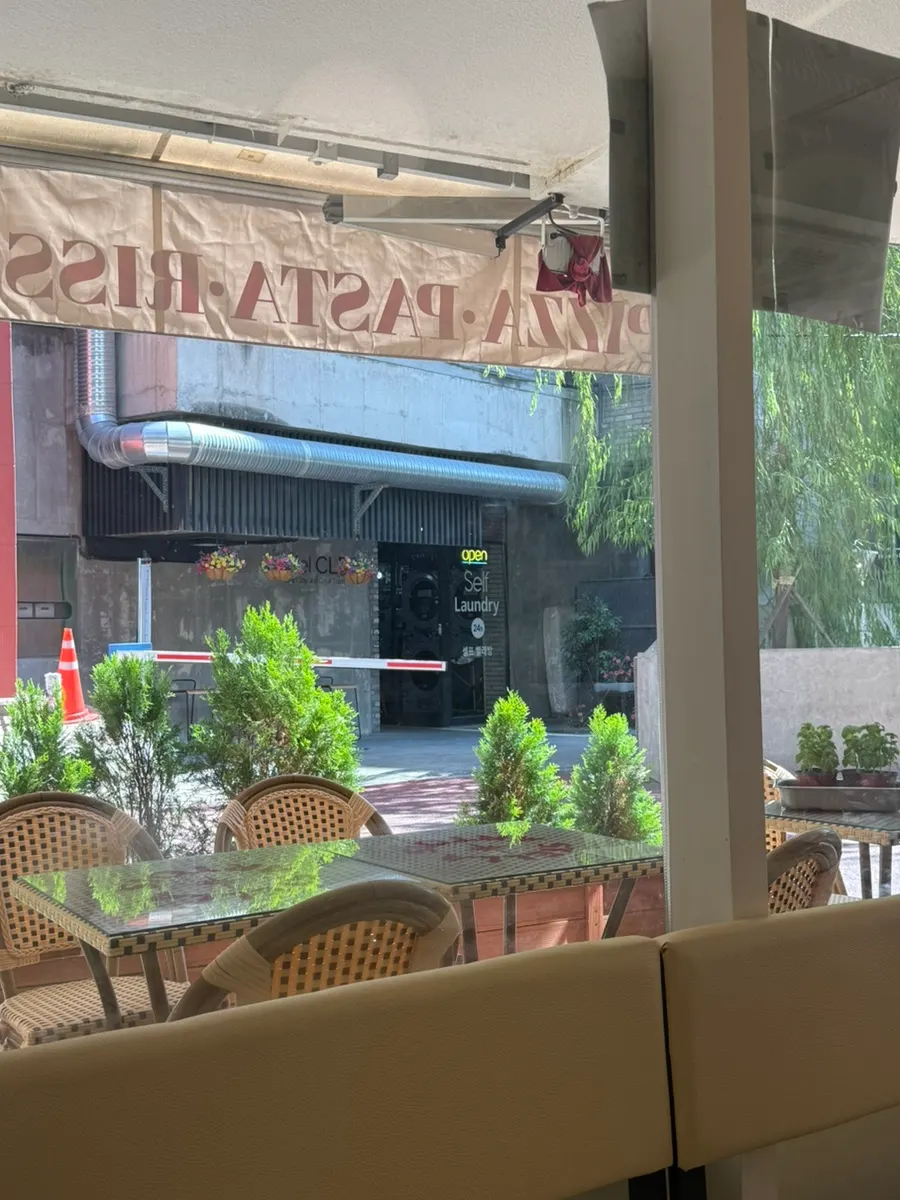 View of the potted plants in front of Classicdang