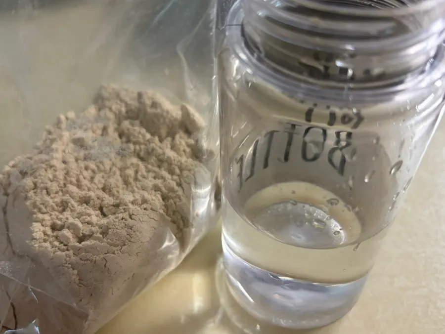Black Bean shaker mixed with water and shaken