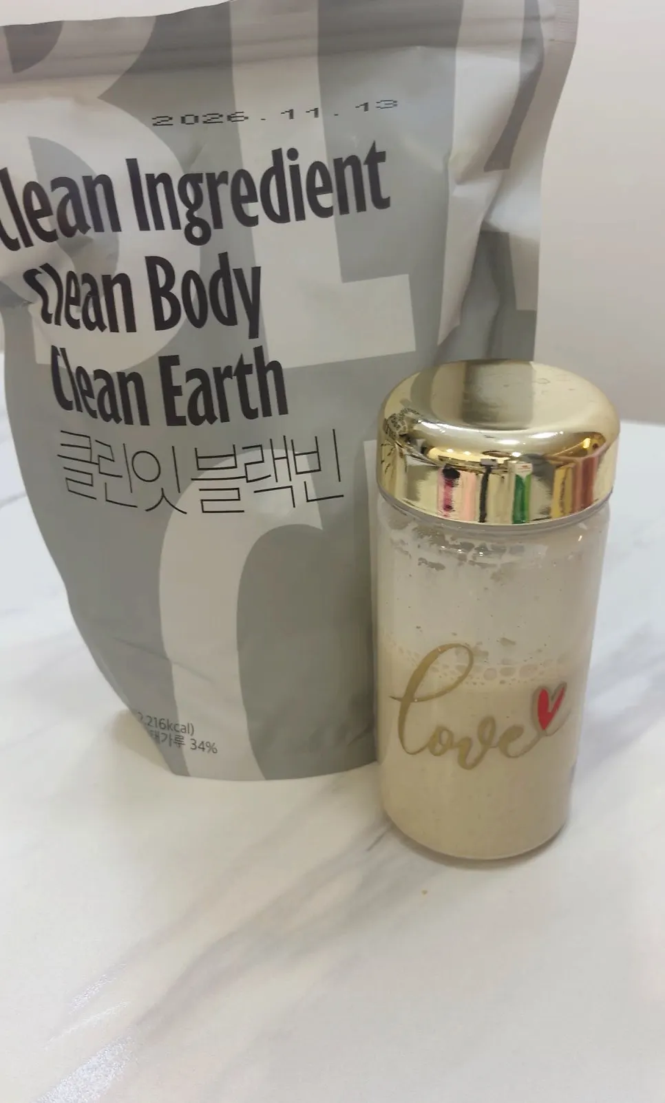 A misugaru-colored cup of black soybean shake