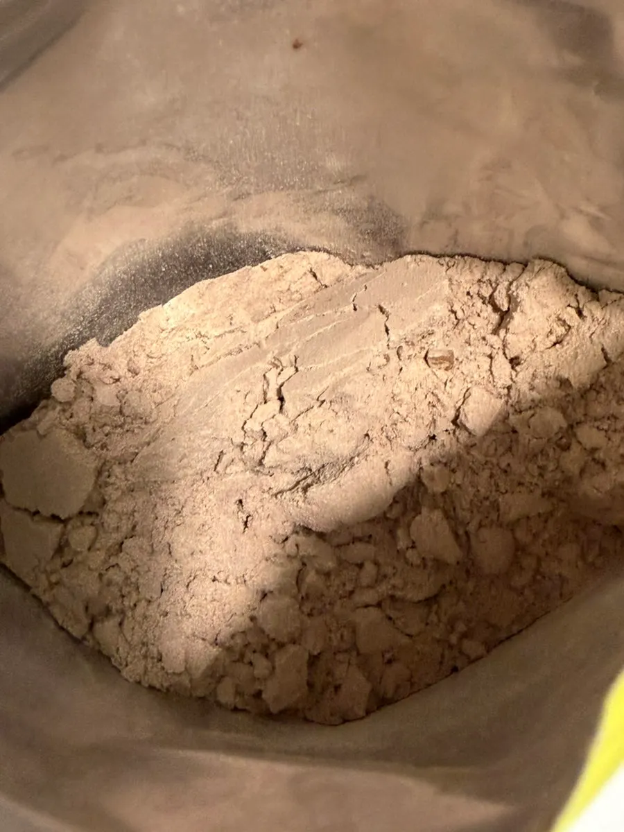 Close-up of the cacao-colored protein powder