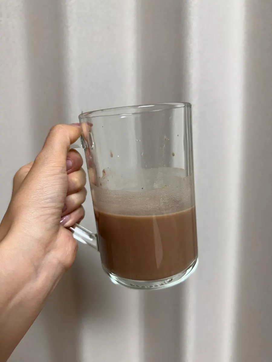 Clean cacao-flavored shake mixed with soy milk