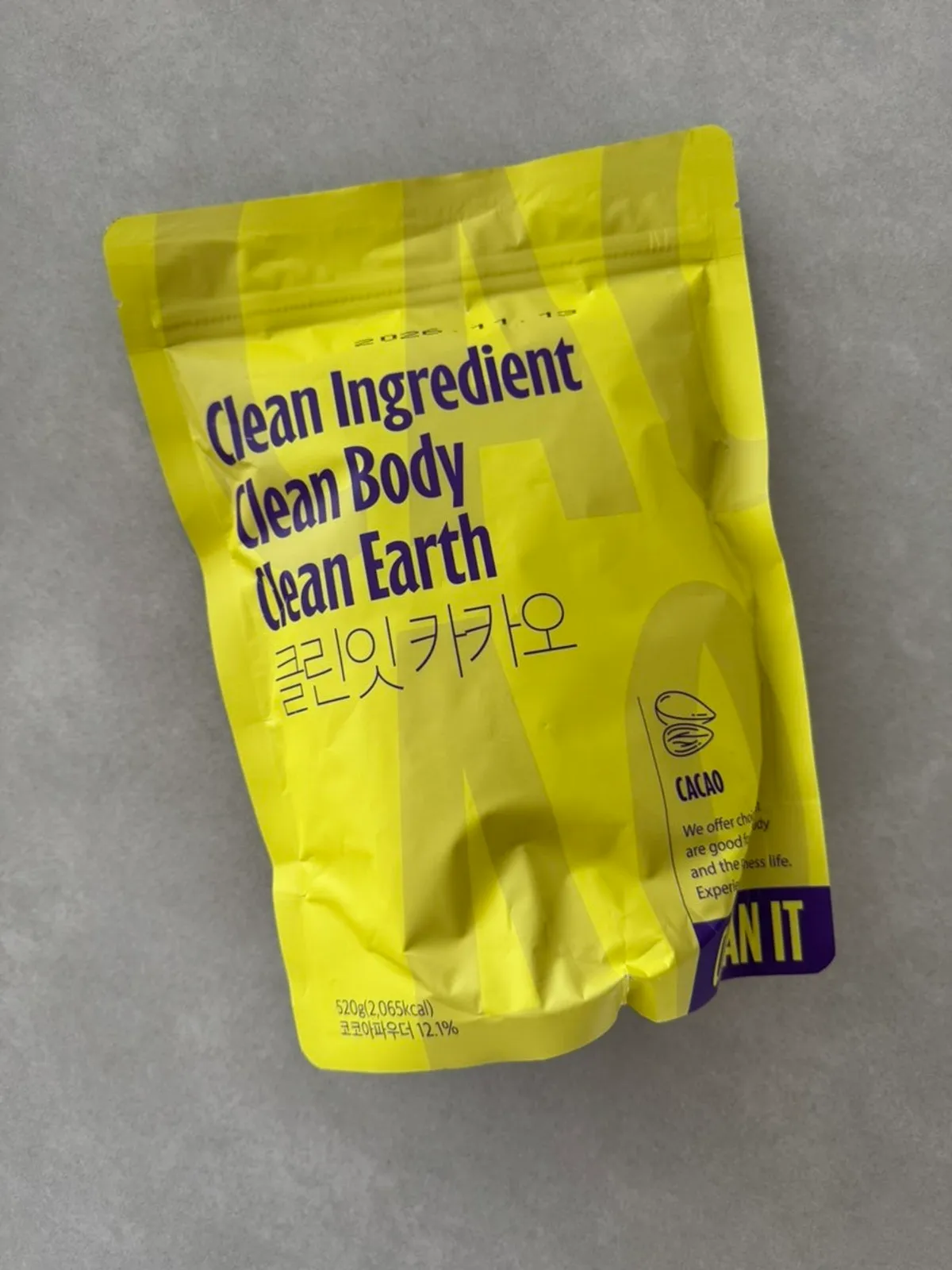 Packaging amarillo del Cleanit Cacao Protein de 520g