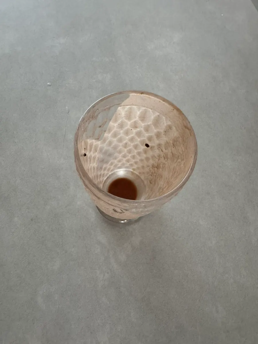Bebida de Cleanit Cacao Protein servida en un vaso