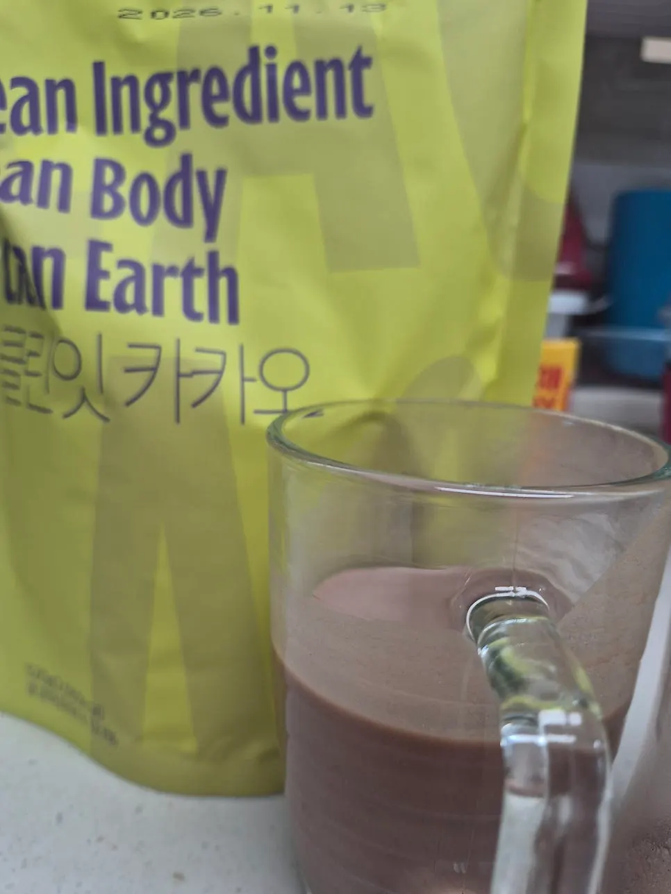 Mild cacao-flavored protein shake