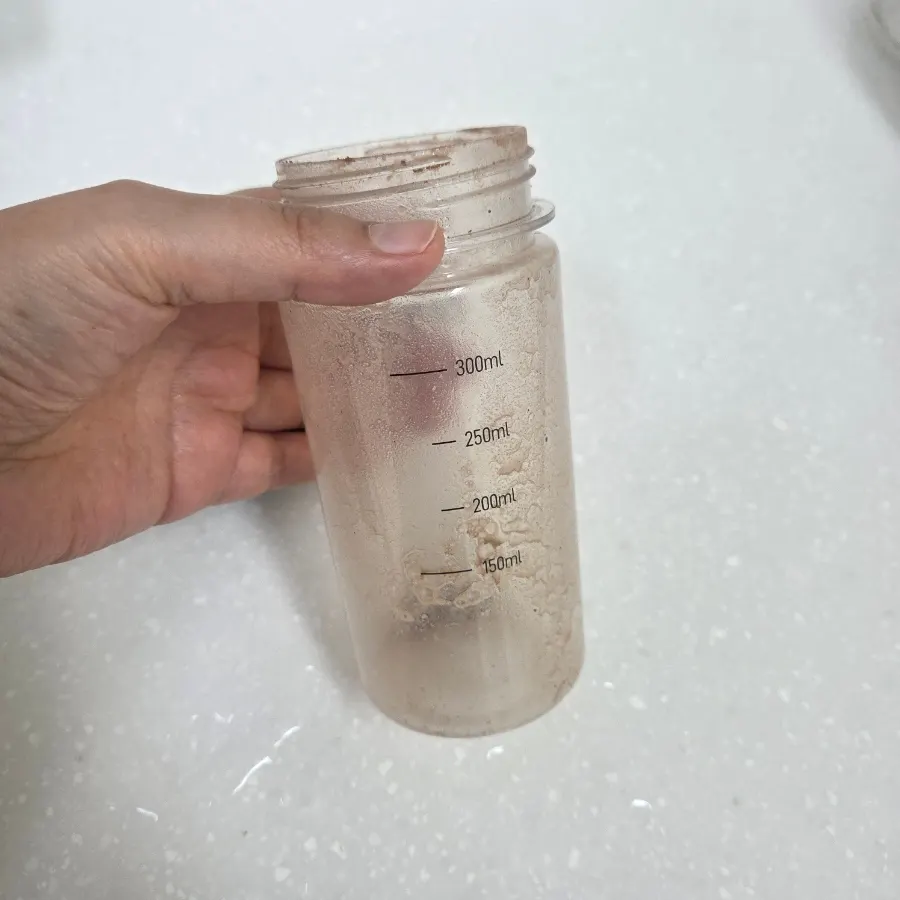 An emptied shaker after finishing the cacao protein shake