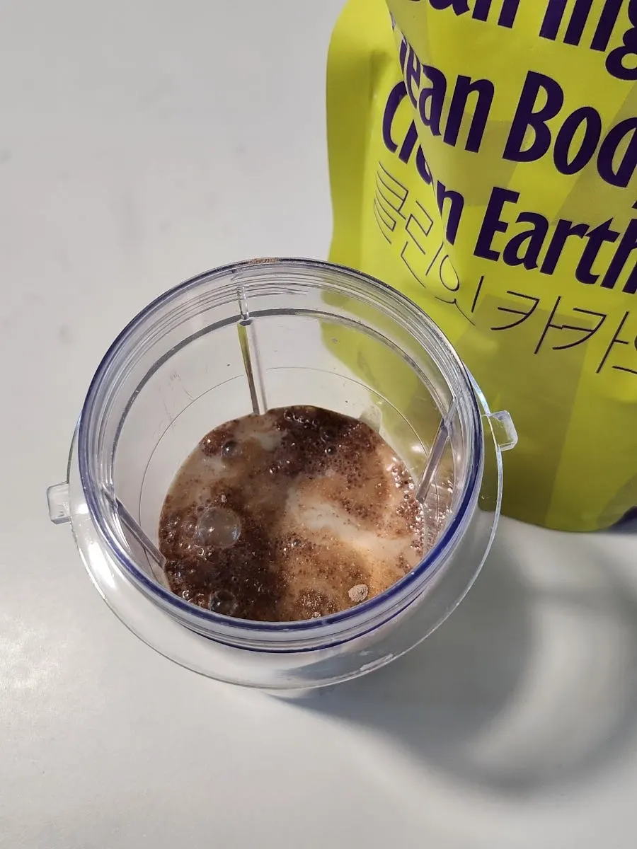 Vegan shake mixed with water and soy milk