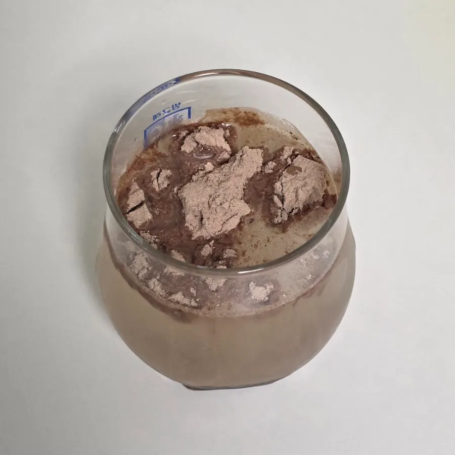 Cleanit Cacao protein drink mixed with water