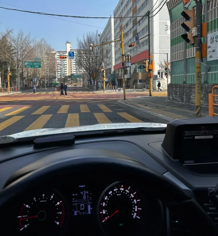 Finished oil-film removal at a self-service car wash in Gangbuk