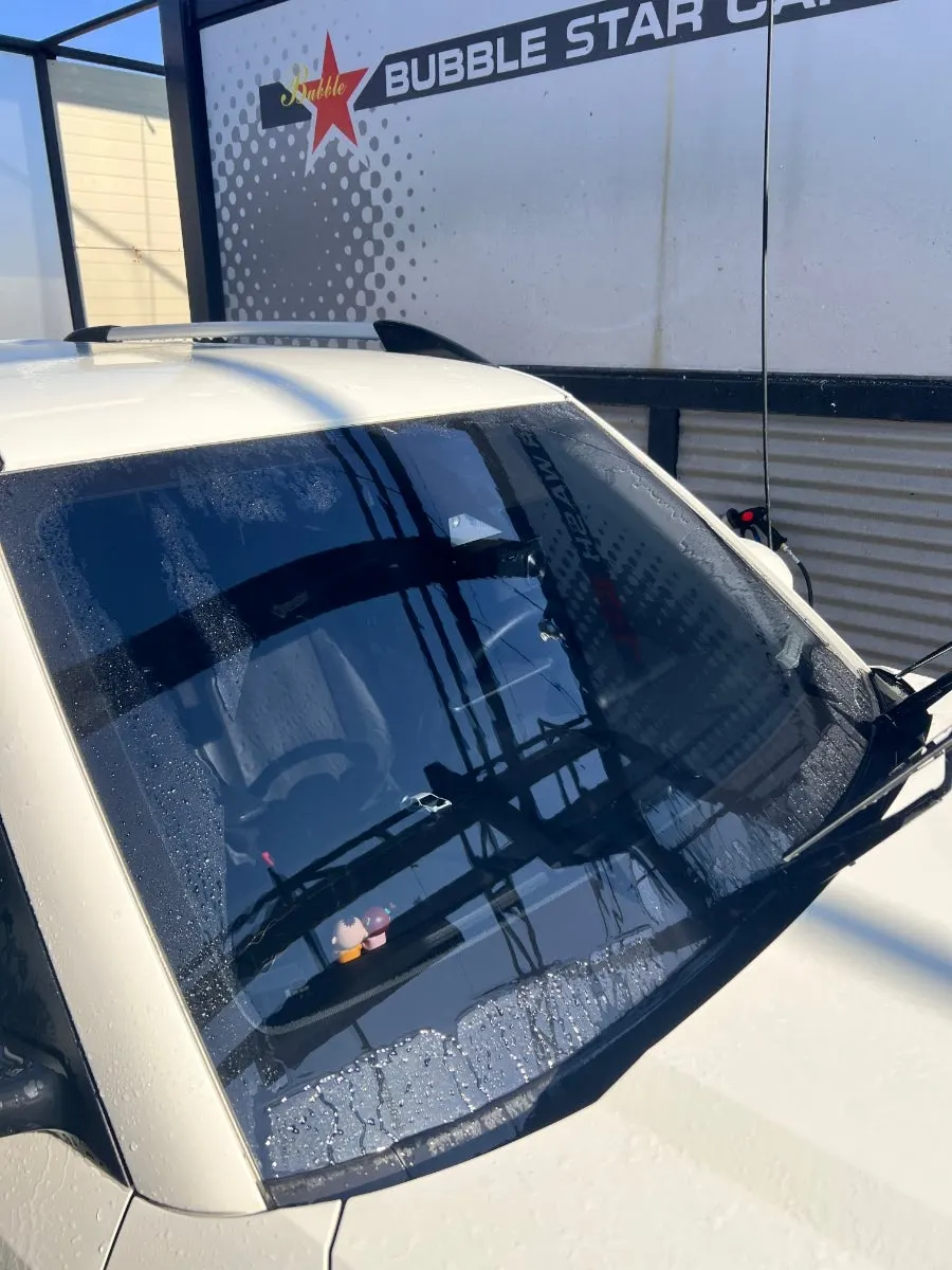 AutoGrooming oil-film remover used to finish a self-service car wash