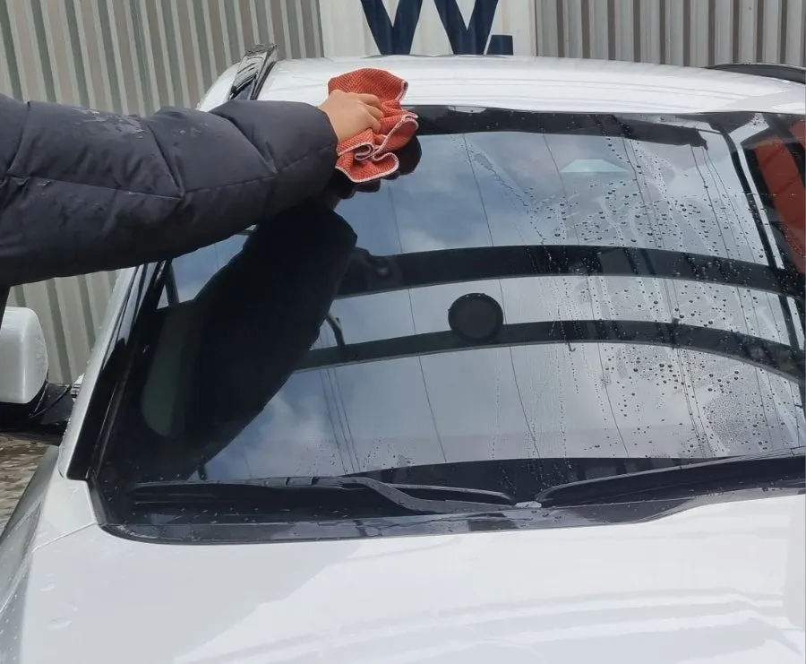 Clean View oil-film remover prepared before a DIY car wash