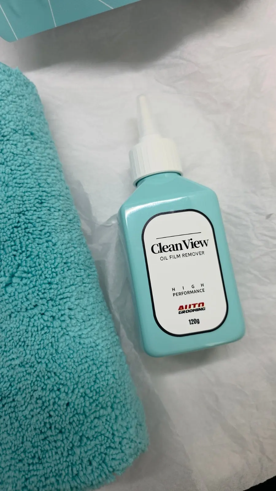 Included AutoGrooming towel for oil film removal