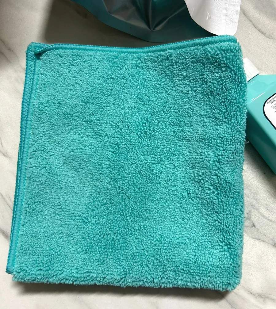 Towel used with AutoGrooming Clean View oil film remover