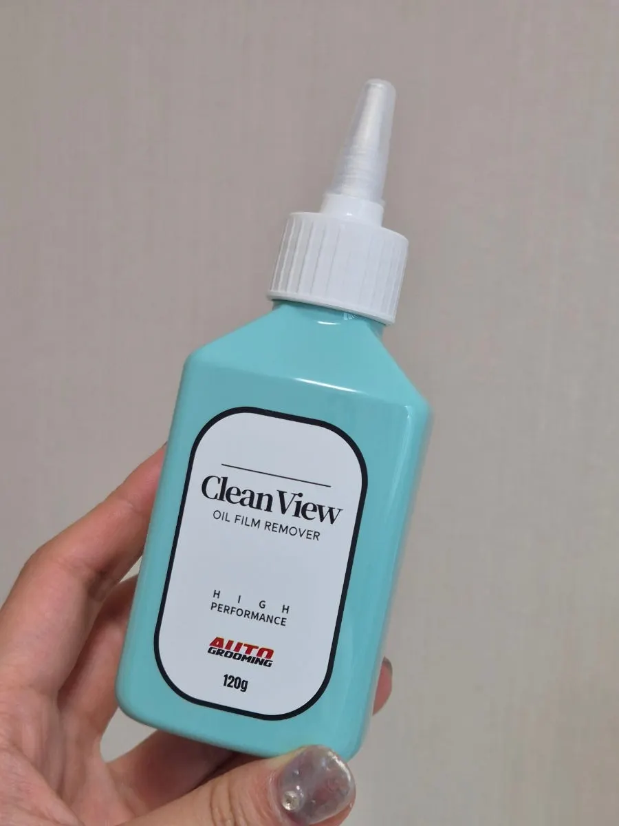 Work towel used to remove grime from car glass