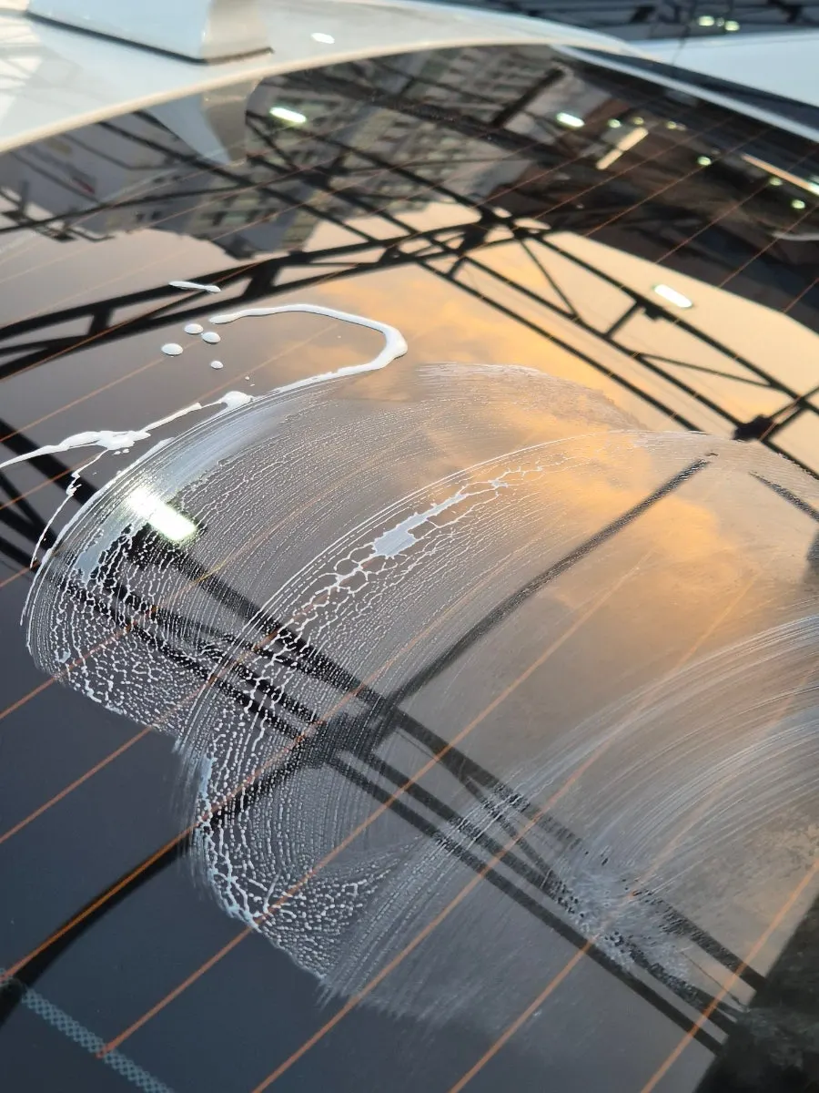 Glass with marks after rubbing in oil film remover