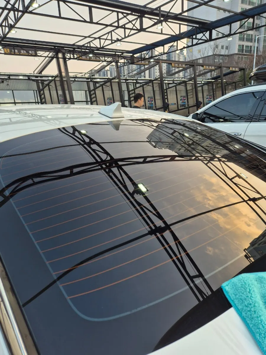 Car glass rubbed with a towel and rinsed with water