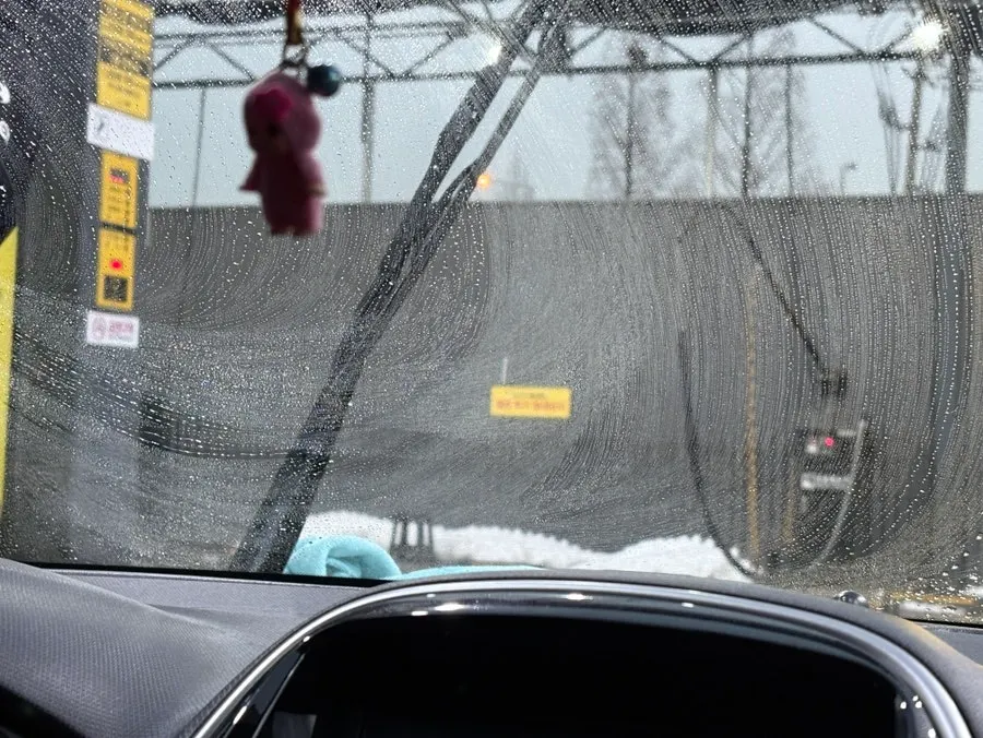 Car wash visited to remove oily film from car glass