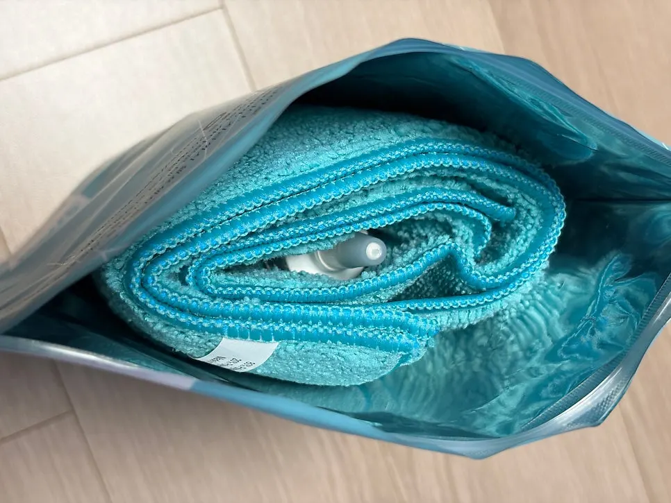 AutoGrooming glass-care product and included towel