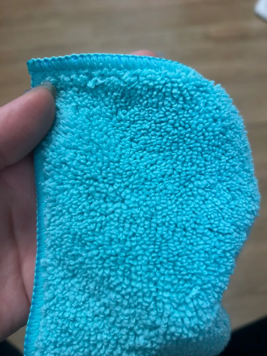 Included towel to use for removing oil film from car glass