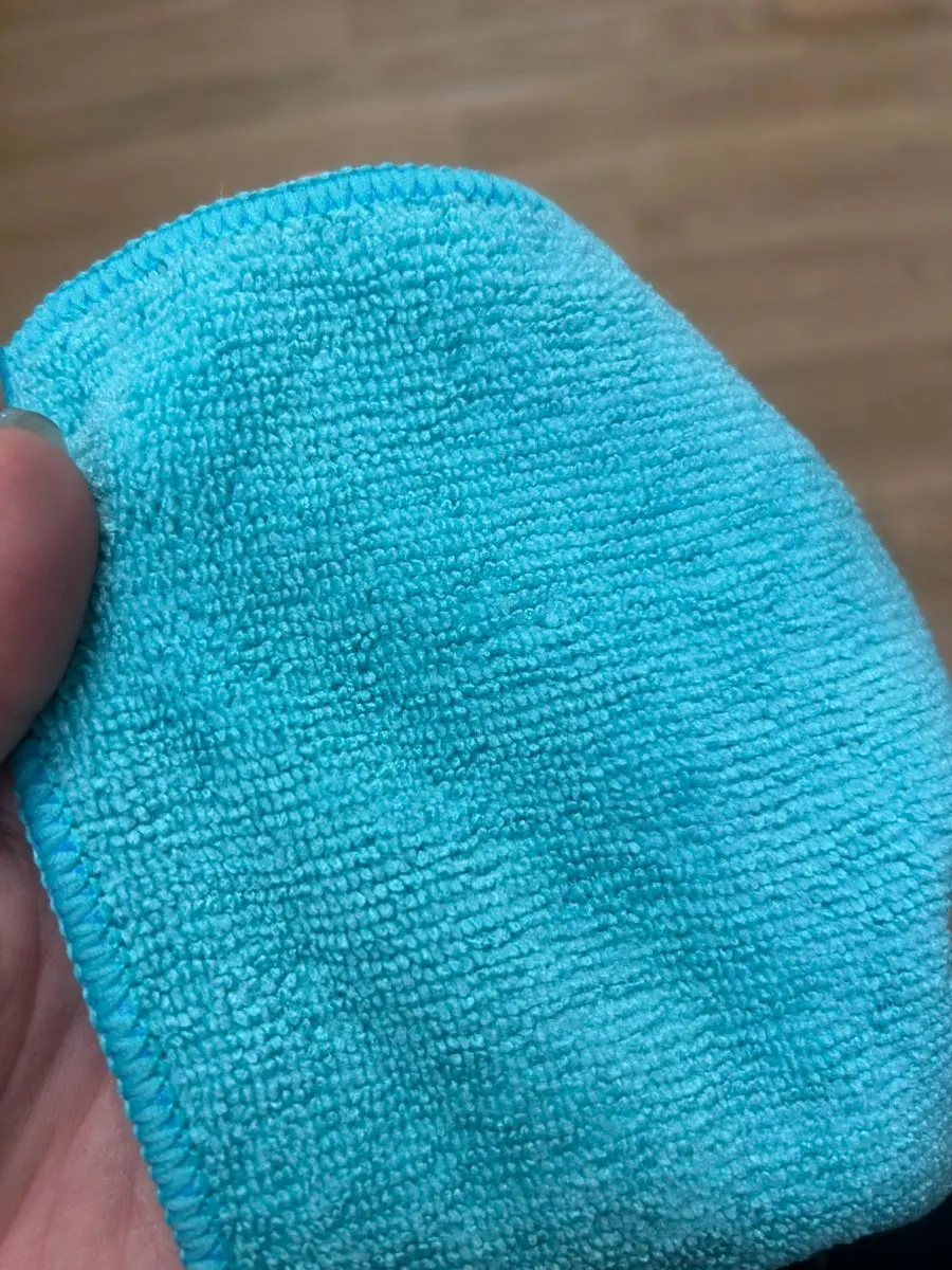 Oil-film remover and towel ready to use at the car wash