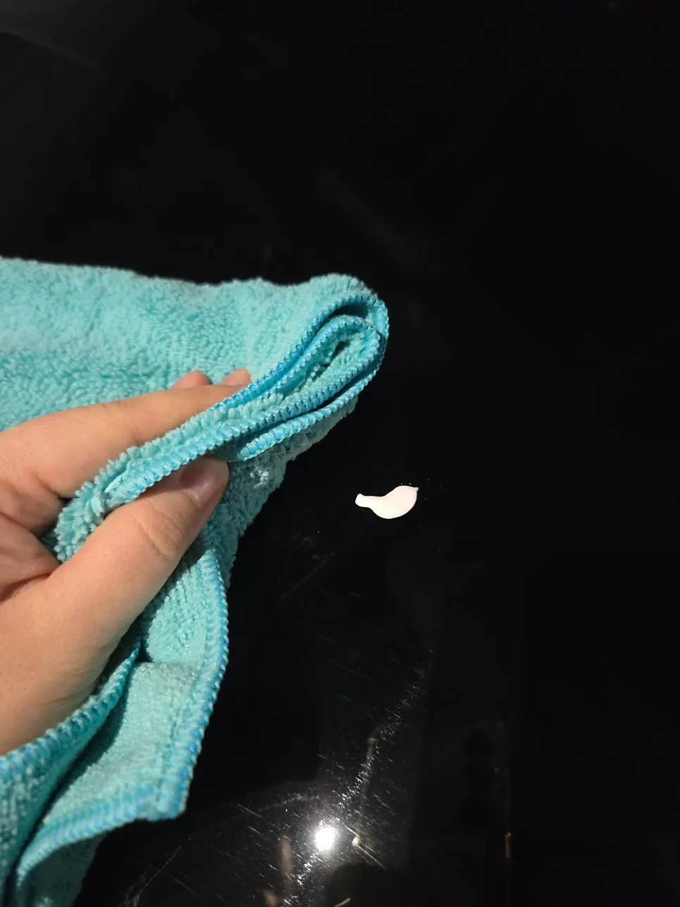 AutoGrooming car-wash product used to remove oil film from glass