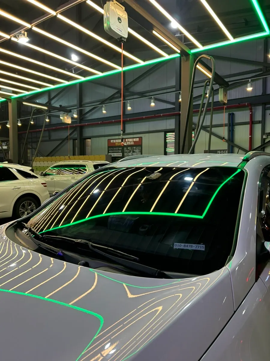 Car glass after completing the rubbing and rinsing process