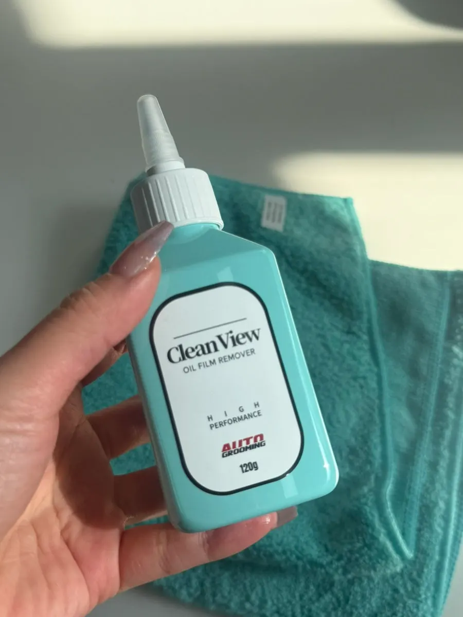 Wiping oil film from glass with an AutoGrooming product